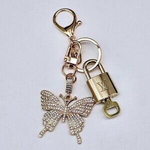 Authentic Louis Vuitton Lock & Key with unbranded Butterfly Bagcharm, Keycharm